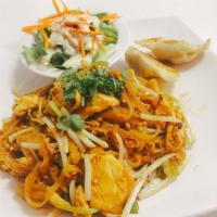 Pad Thai · Thin rice noodles pan fried with tamarind juice, egg, bean sprouts, green onions, peanuts an...