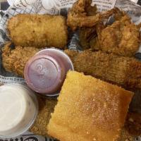 Fried Catfish · 2 farm-raised catfish filets dipped in our special batter and rolled in our cornbread meal r...