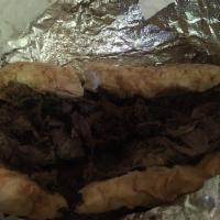 Italian Beef Sandwich · Thinly sliced top sirloin, slow-roasted and cooked in our house-made Italian au jus. Add ons...