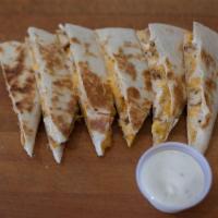 Cheesy Chicken Quesadilla · A blend of Monterrey Jack and cheddar cheese with grilled chicken.