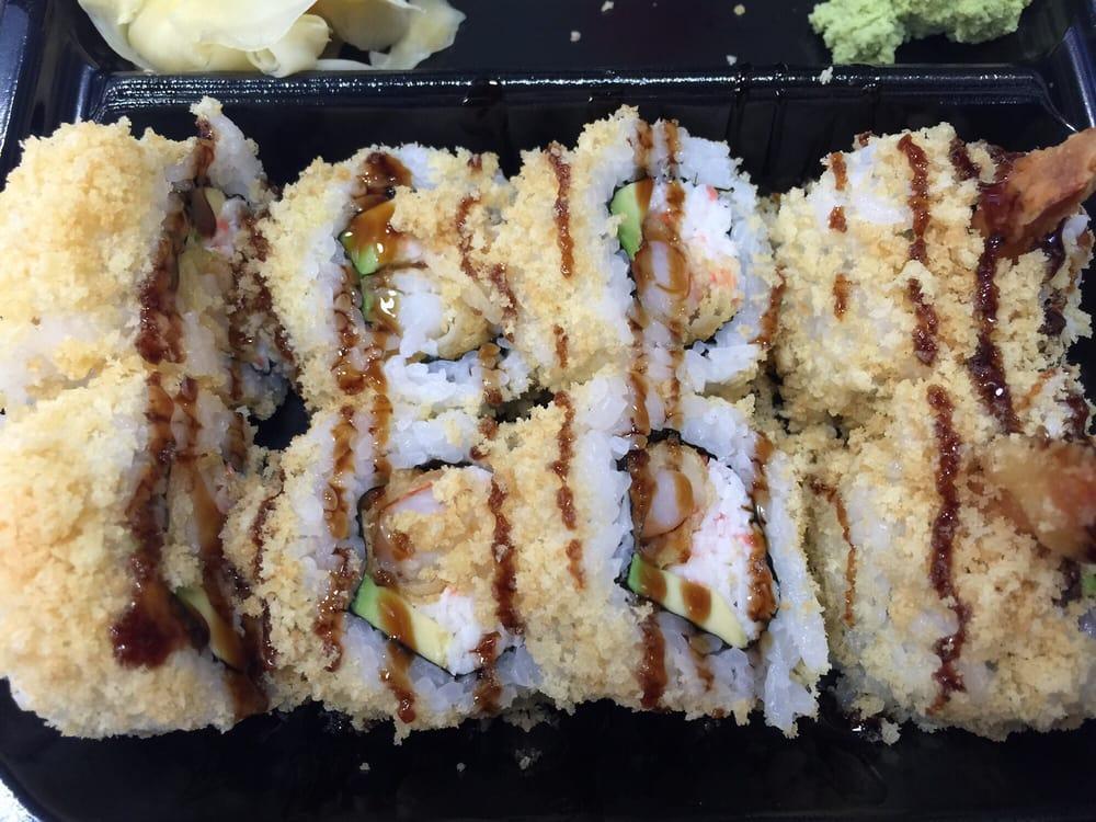 Crunch Roll · Shrimp Tempura, Crabmeat & Avocado Inside with tempura crunch
on top.