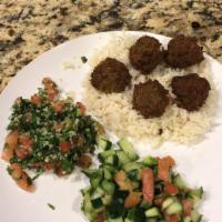Falafel Plate · Garbanzo beans and veggies. Includes lettuce, tomatoes and cucumber as well as salad, tahini...