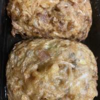 Egg Foo Young · Egg patty with cabbage, bean sprouts and onions in brown gravy with peas, carrots and snow p...