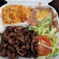 Carne Asada Plate · Served with rice and beans.