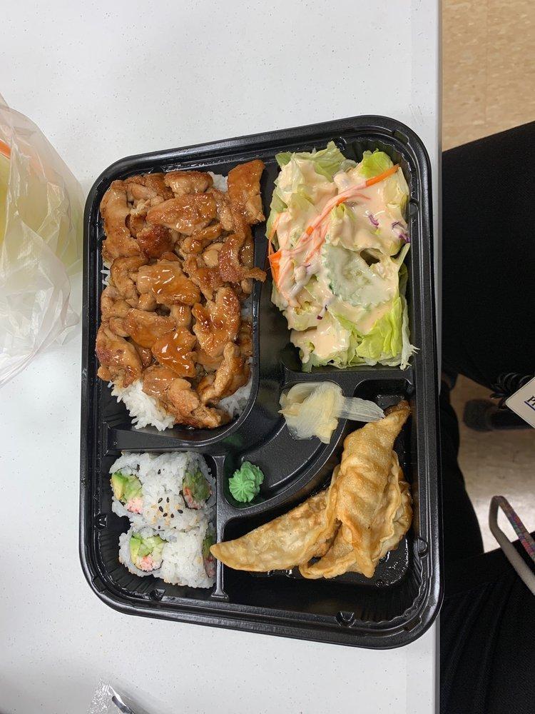 Chicken Bento Box · Served with steamed rice, California roll (4pcs), dumplings (3pcs) and garden salad.
