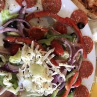 Antipasto Salad · Iceberg lettuce, mozzarella, pepperoni, salami, ham, black olives, cherry tomatoes, red onio...