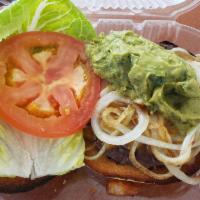 Mexican Burger · Beef patty with lettuce, guacamole, onions, lettuce, tomato and cheddar cheese served with f...