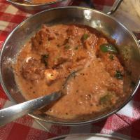 Chicken Tikka Masala · Chunks of chicken roasted in oven and then folded into a cream sauce.