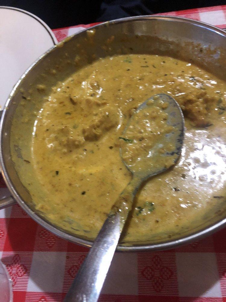 Chicken Curry · Chicken cooked with a delicately spiced curry sauce.
