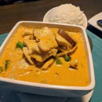 Red Curry · Red curry paste and choice of protein cooked with coconut milk, bamboo shoots, eggplant, gre...