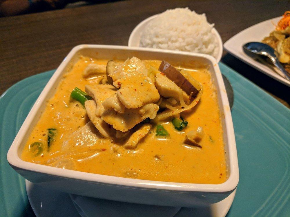Red Curry · Red curry paste and choice of protein cooked with coconut milk, bamboo shoots, eggplant, green bean, bell peppers, and Thai basil leaves.