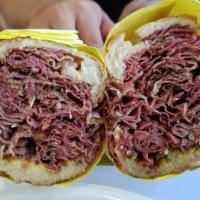 Pastrami Sandwich · Served with mustard and pickles on a French roll.