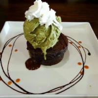 Molten Lava Cake · Served with green tea ice cream.