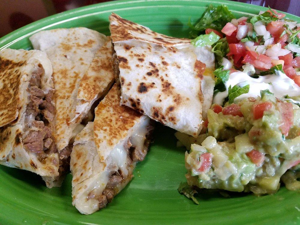 Quesadilla · Grilled flour tortilla with cheese.