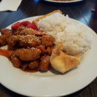 Honey Sesame Chicken · Breaded chicken wok-seared w/ carrots and bell peppers in our honey sesame sauce topped with...