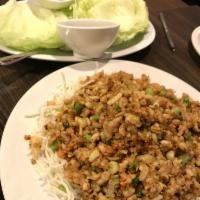Asian Lettuce Wraps · Diced juicy white meat chicken w/ water chestnuts, green onions, celery, and carrots. Served...
