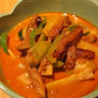 Red Curry · Coconut milk, basil leaves, bamboo shoots, bell peppers, eggplant in red curry paste.