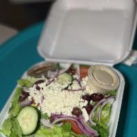 Greek Salad · Lettuce mix, tomatoes, onions, cucumber, Kalamata olives, feta cheese with house dressing.
