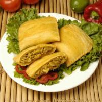 Chicken Patty · Spicy curried chicken wrapped in our signature pastry. Spicy.