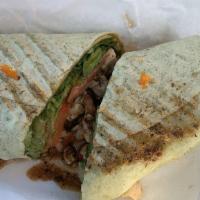 Jerk Wrap · Grilled chicken breast, lettuce, tomato, onion, and hybrid jerk blend served on spinach wrap.
