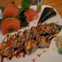 Manhattan Roll · Deep fried roll of smoked salmon with cheese and avocado, eel, and kani, with sauce on top. ...