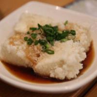 Agedashi Tofu · Tofu, 7 spices, scallion and bonito flakes.

*can be vegan without bonito flakes.