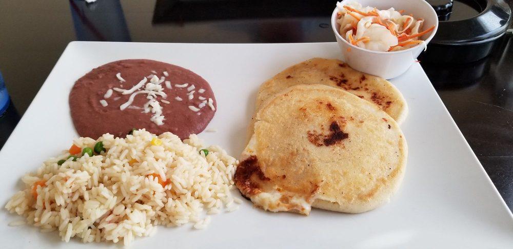 Pupusas · Your choice of 2 pupusas served with rice and beans.
