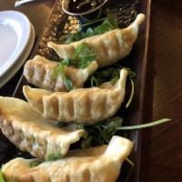 Fried Dumplings · 5 pieces. Pork and vegetables dumplings served with homemade citrus soy sauce.