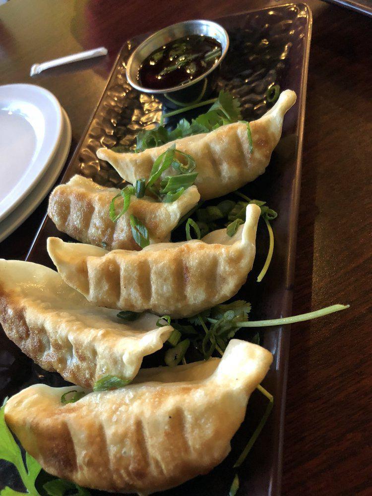Fried Dumplings · 5 pieces. Pork and vegetables dumplings served with homemade citrus soy sauce.