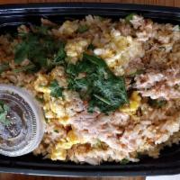 Crab Fried Rice · Stir-fried rice, real crab meat, scallions, cilantro and scrambled egg.