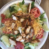 Blackened Chicken Salad · Lettuce, tomatoes, onion and cheese.