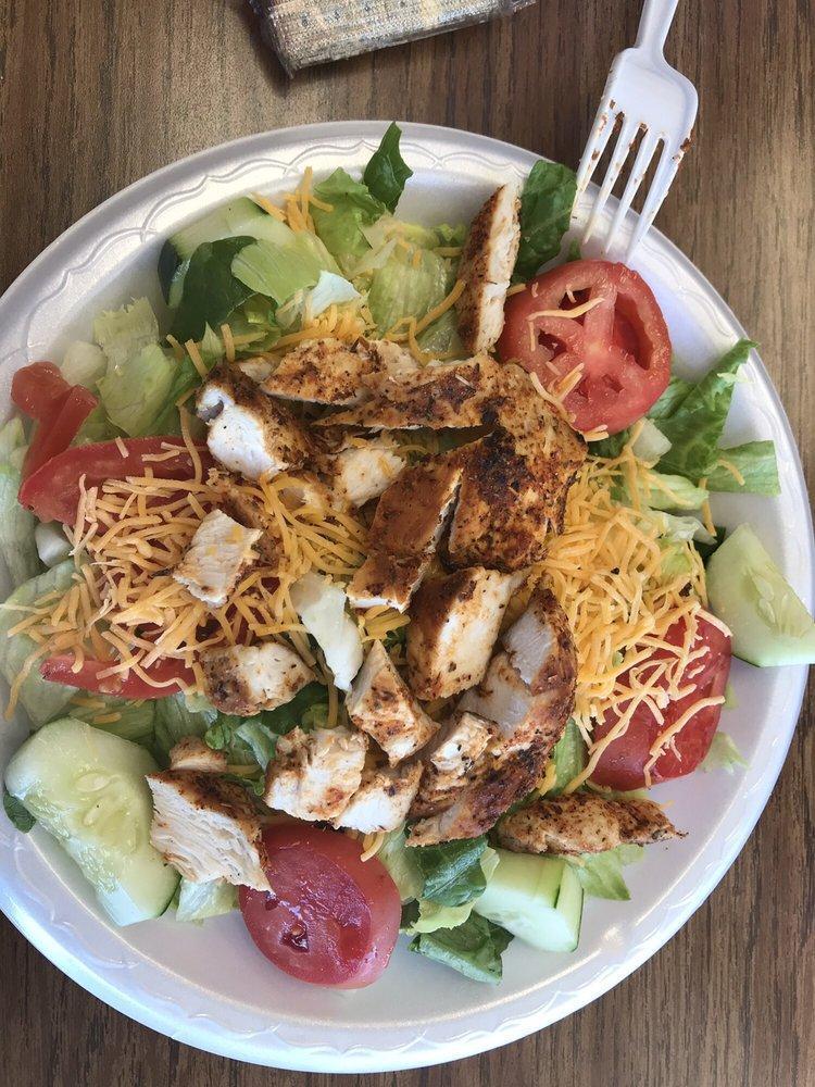 Blackened Chicken Salad · Lettuce, tomatoes, onion and cheese.