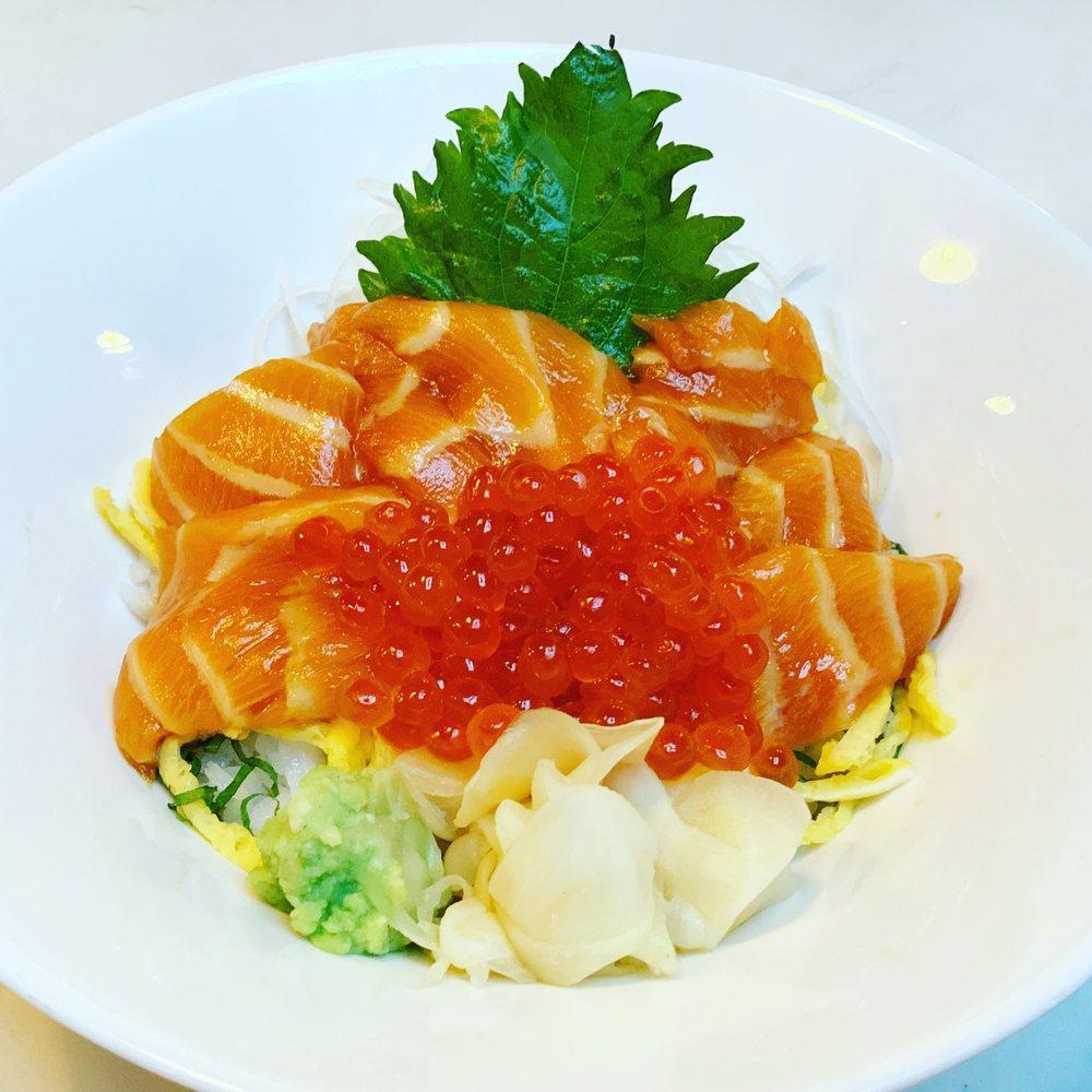Sake Ikura Don · Marinated salmon sashimi & ikura, hot rice, shiso, julienne daikon, nori, pickled ginger, fresh wasabi.