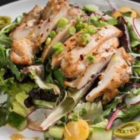 Market Salad · Mixed greens, radish, cucumbers, tomato, red onion, yuzu vinaigrette. 
Photo has Grilled chi...