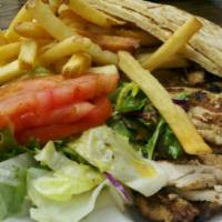 Grilled Chicken Strips Meal · Served with salad, pita bread and a choice of hot side. 