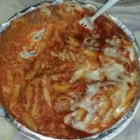 Baked Ziti Dinner · Served with side salad with garlic bread.