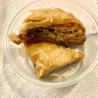 Baklava · Made of layers of filo filled with chopped nuts, sweetened and held together with honey.