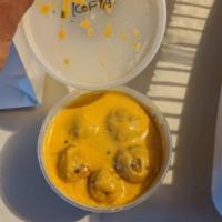 Malai Kofta · A true Moghulai delight. Vegetable balls simmered in a creamy sauce.