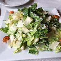 Caesar Salad · Romaine lettuce with croutons, shaved Parmesan, in a Caesar dressing.