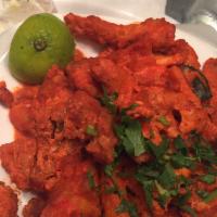 Apollo Fish · Battered fish fried in special spicy masala.