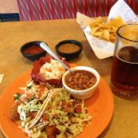 Fish Tacos · 3 fish tacos (baked tortilla crusted tilapia). Finished with cabbage, fresh pico de gallo an...