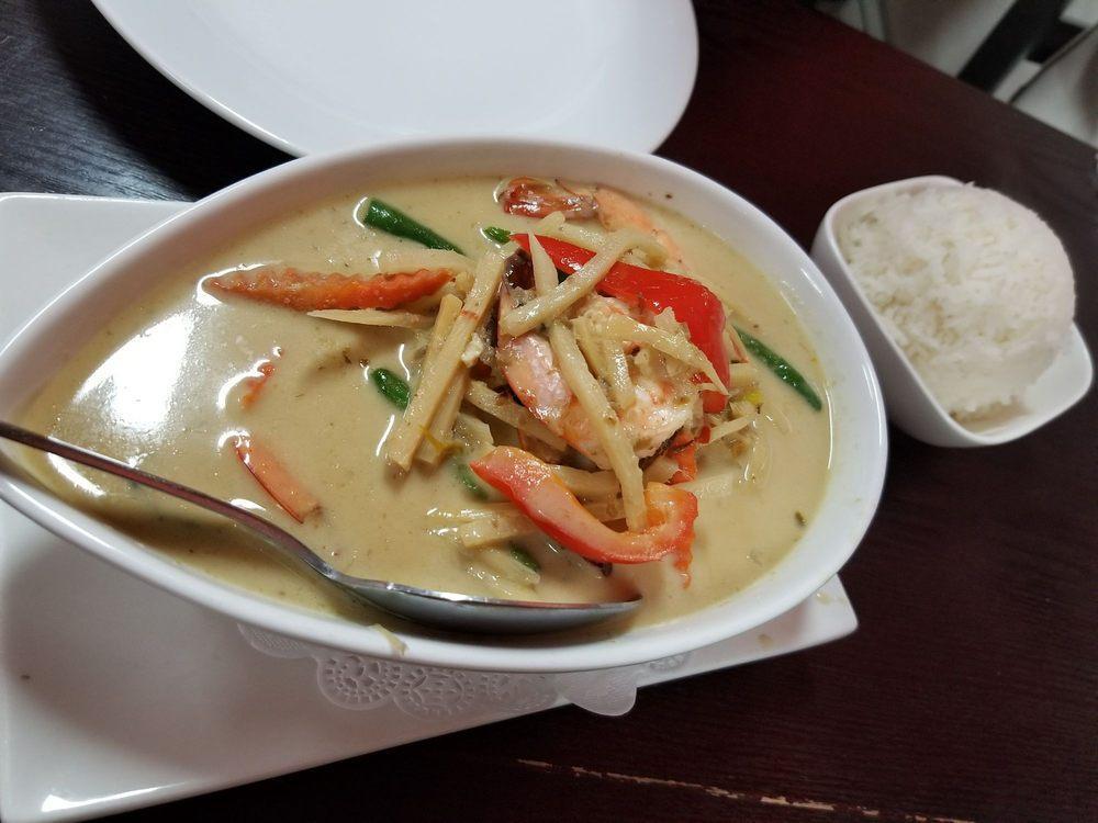 Green Curry · Green curry with coconut milk, green beans, bell peppers, bamboo shoots, carrots, and basil leaves. Served with jasmine rice. Spicy.