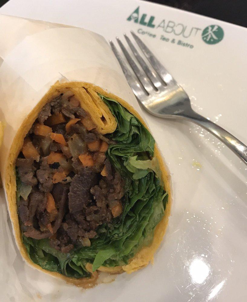 Bulgogi Wrap · Freshly made and house marinated Korean bulgogi beef. Sautéed with yellow onions and carrots. Wrapped in a jalapeno cheddar tortilla wrap with romaine. Comes with a side of chips or fresh fruit. (Pineapple, melon, and grapes).