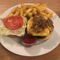 Black Bean Burger · Savory, topped with lettuce, tomato, pickles, grilled onions, american cheese and aoli. Spec...