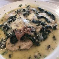 Saltimbocca · Sautéed spinach and sage layered with parma prosciutto and fontina cheese baked in a white w...