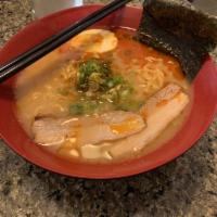 Spicy Ramen · Your choice of chicken or pork chashu, green onions, egg, seaweed, bean sprouts, & garlic ch...