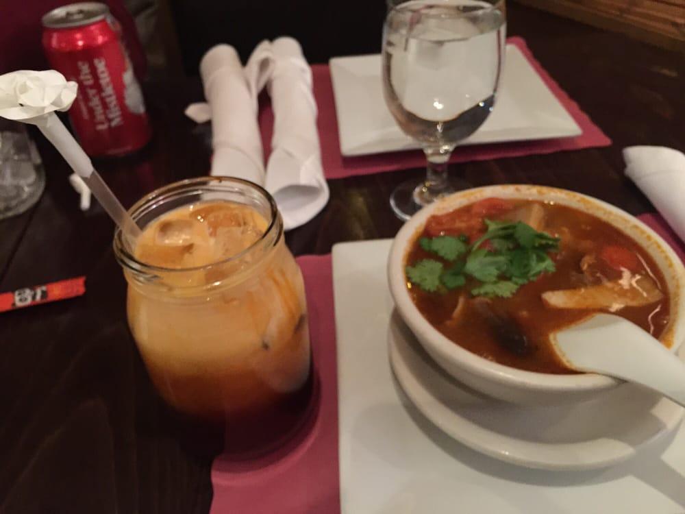 Tom Yum Soup · Savory sour soup with shrimp, mushrooms, lemongrass, lime leaves, tomatoes, chilies and cilantro. Spicy.