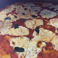 Margherita · Thin crust pizza with fresh mozzarella, marinara and fresh basil.