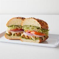 Chicken Pesto Sandwich · Grilled chicken breast, pepper jack cheese, onions, tomato, clover sprouts, and Erik's basil...