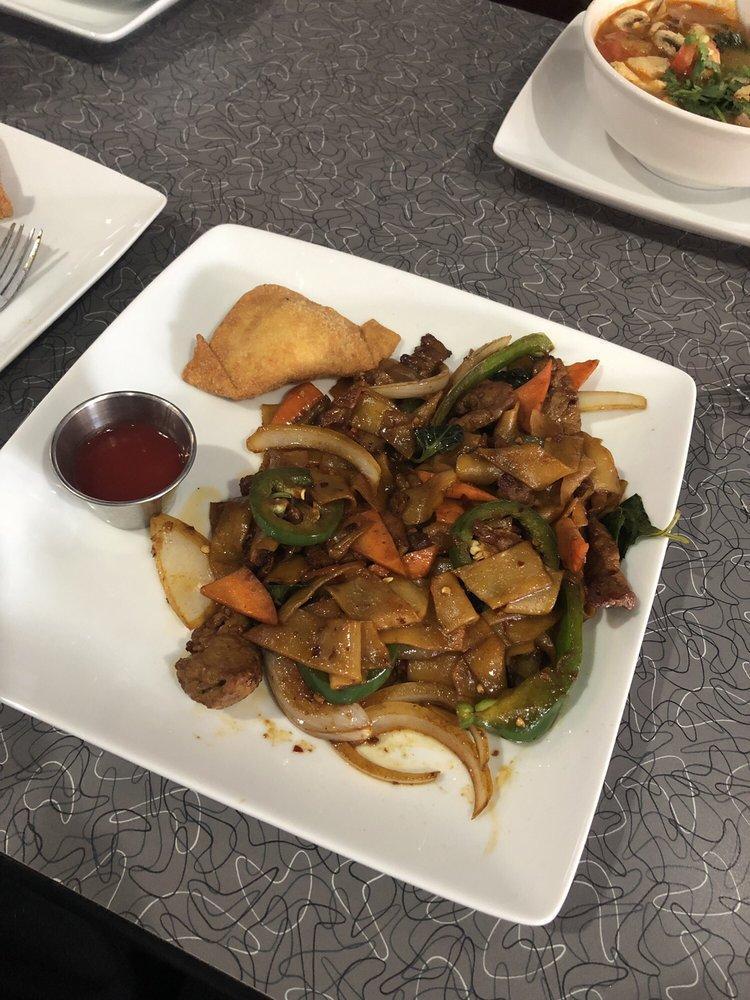 Drunken Noodles · Wide rice noodles with carrots, tomatoes, onions, bell pepper, jalapeno and basil on a spicy house sauce.